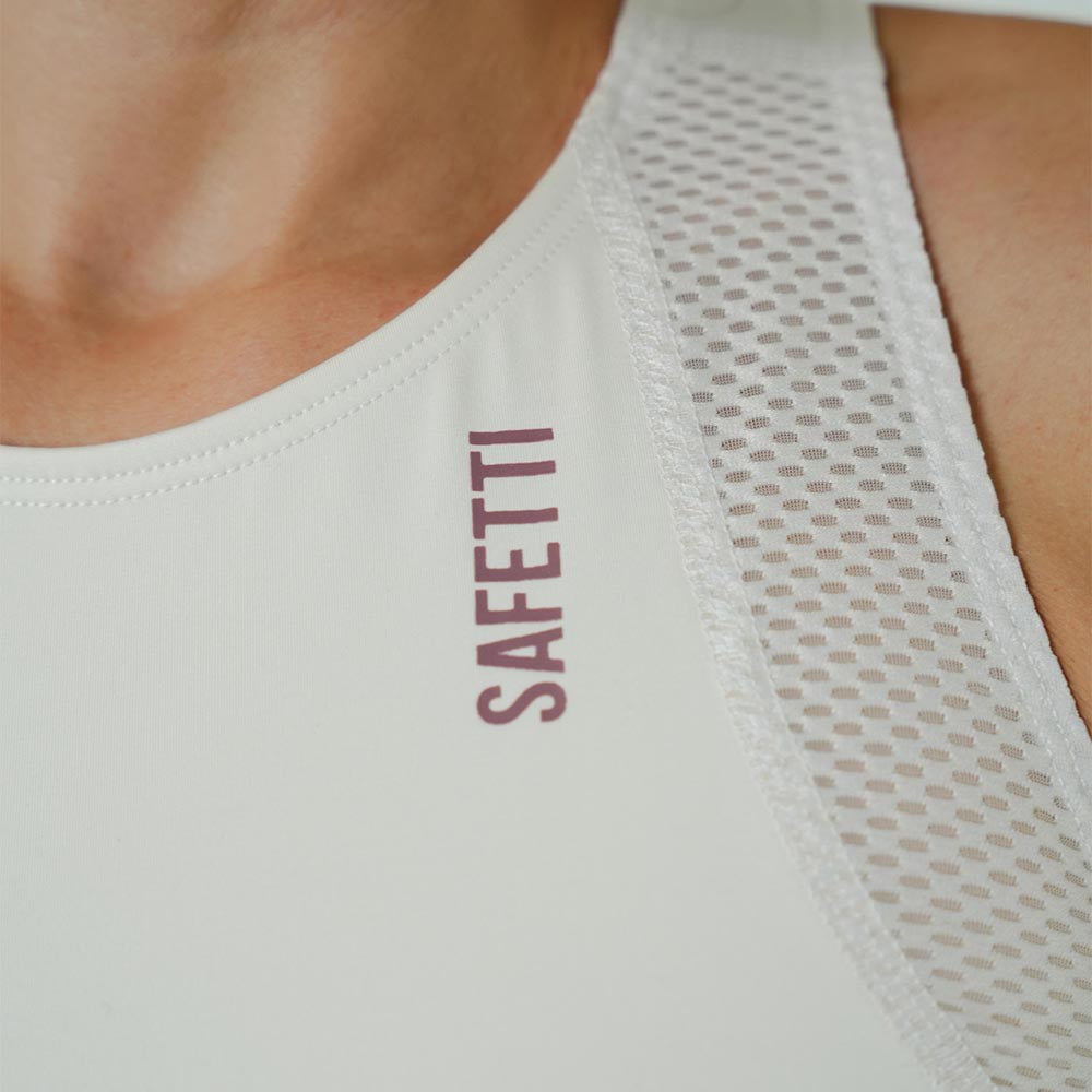 TOP RUNNING/PÁDEL POCKET IVORY PARA MUJER