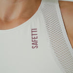 TOP RUNNING/PÁDEL POCKET IVORY PARA MUJER