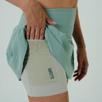 FALDA SHORT RUNNING/PÁDEL FLOW FIT GREEN PARA MUJER