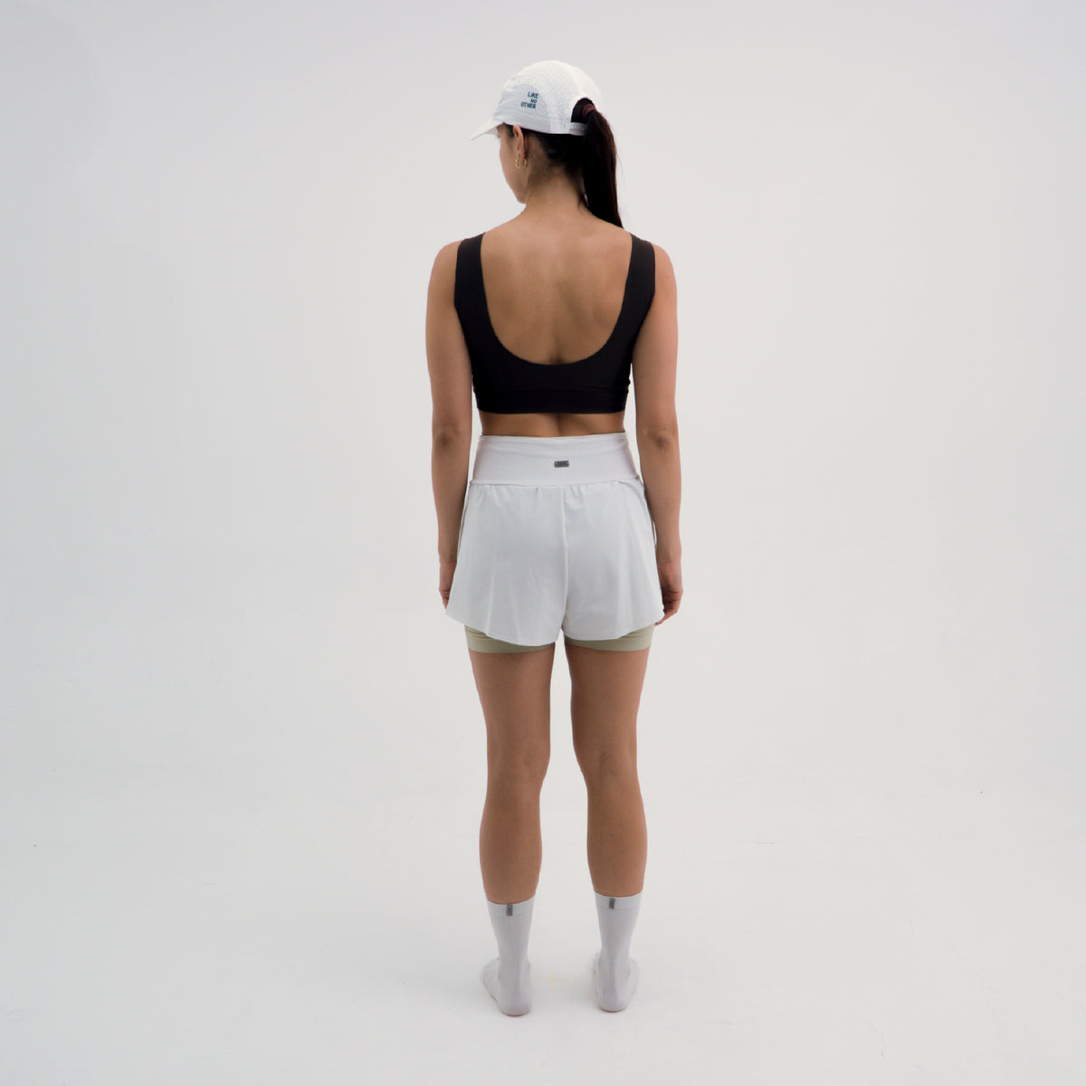 PANTALONETA RUNNING/PÁDEL BREEZE BLANCA PARA MUJER