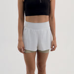 PANTALONETA RUNNING/PÁDEL BREEZE BLANCA PARA MUJER