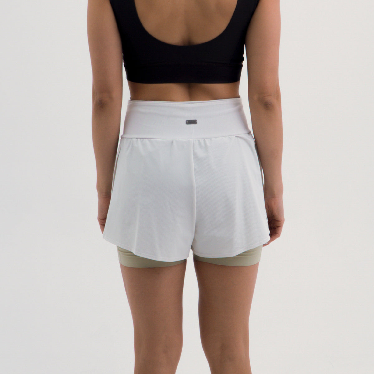 PANTALONETA RUNNING/PÁDEL BREEZE BLANCA PARA MUJER