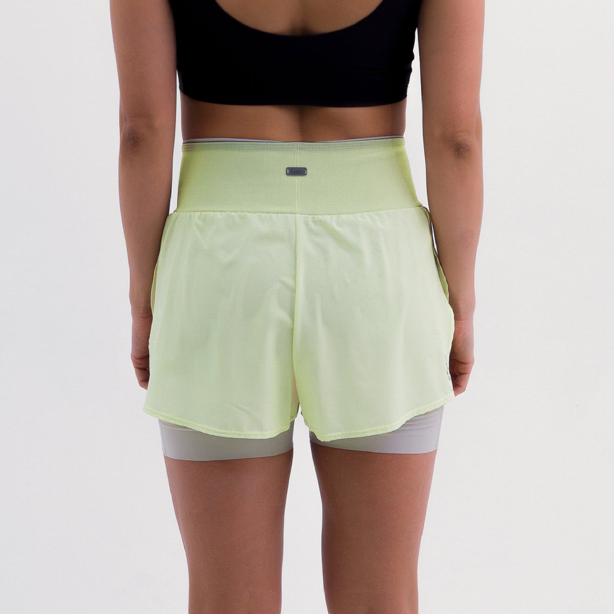 PANTALONETA RUNNING/PÁDEL BREEZE YELLOW PARA MUJER