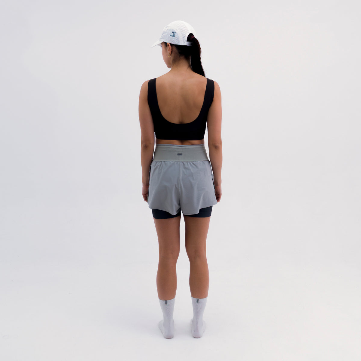 PANTALONETA RUNNING/PÁDEL BREEZE GRAY PARA MUJER