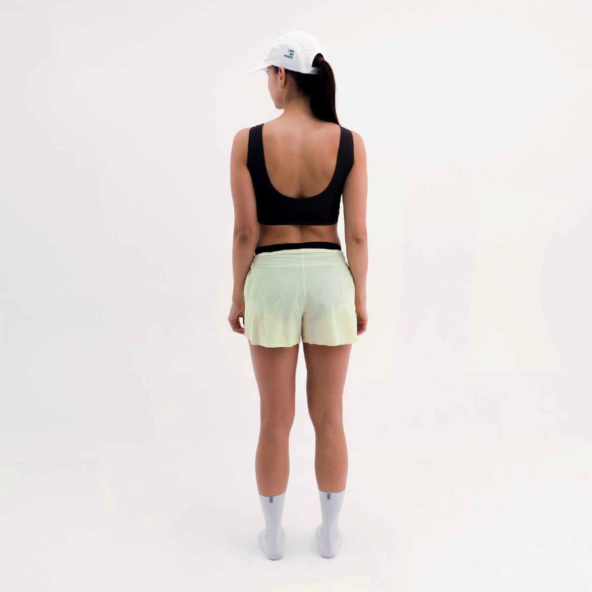 SHORT RUNNING/PÁDEL FLOW YELLOW PARA MUJER