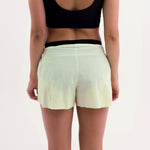 SHORT RUNNING/PÁDEL FLOW YELLOW PARA MUJER