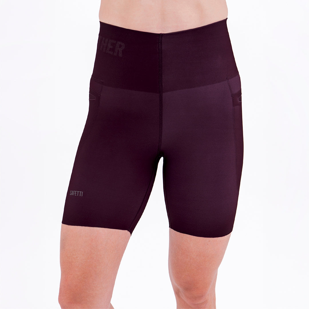 SHORT RUNNING TITÁN EVO CIRUELA PARA MUJER