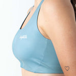 TOP RUNNING DUOMOTION AZUL POLVO PARA MUJER