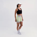 PANTALONETA RUNNING/PÁDEL BREEZE YELLOW PARA MUJER