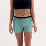 SHORT RUNNING/PÁDEL FLOW GREEN PARA MUJER