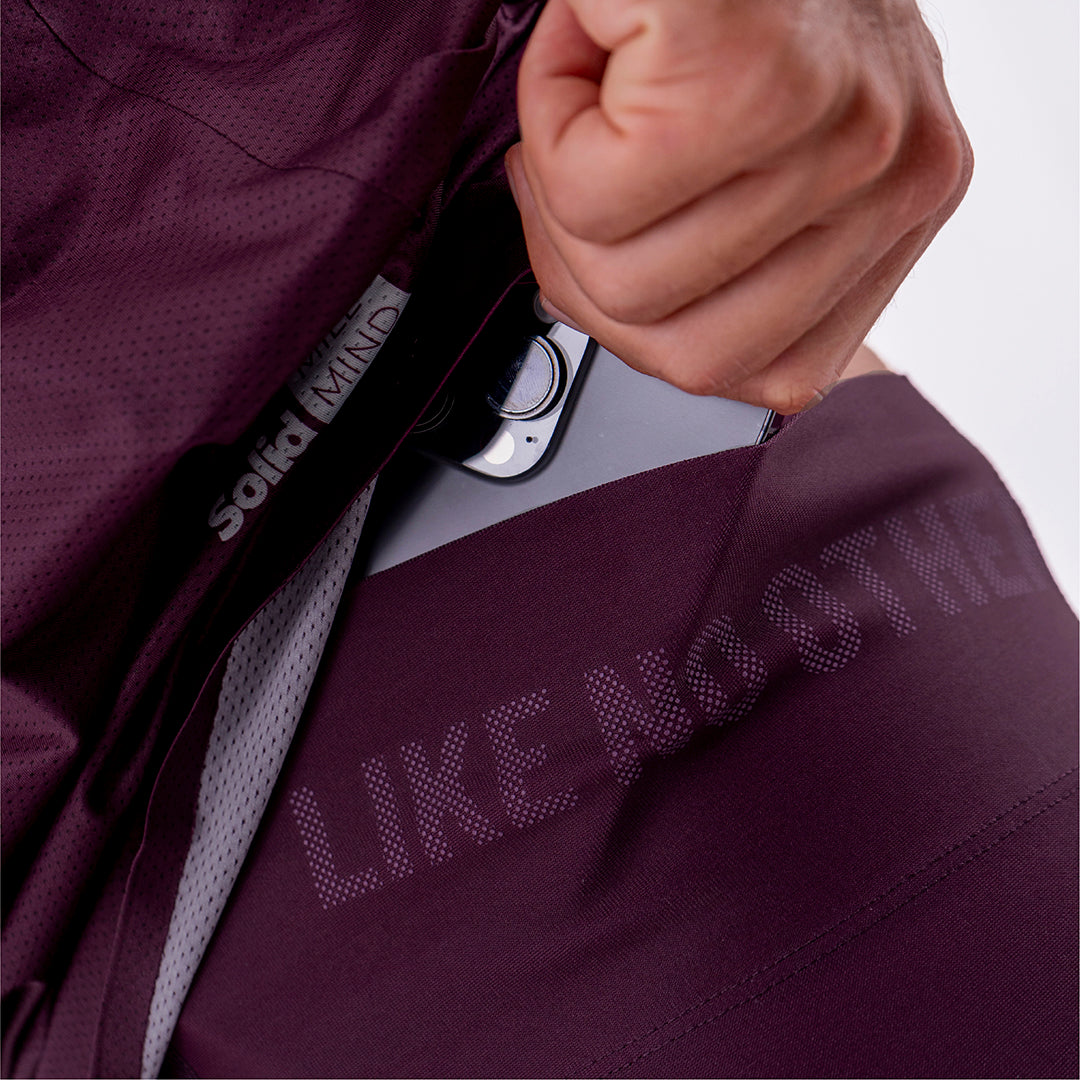 SHORT RUNNING TITÁN EVO CIRUELA PARA HOMBRE