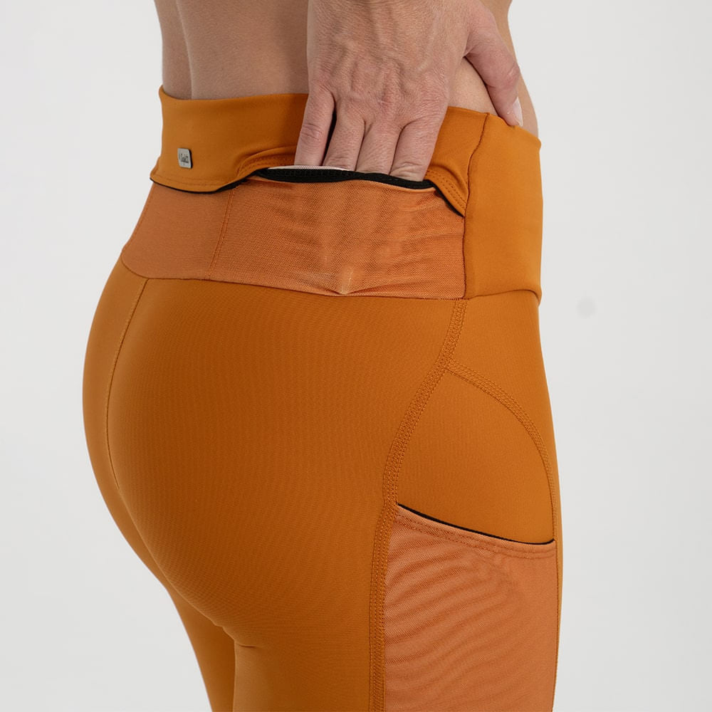 SHORT RUNNING TITÁN 2.0 CARROT PARA MUJER