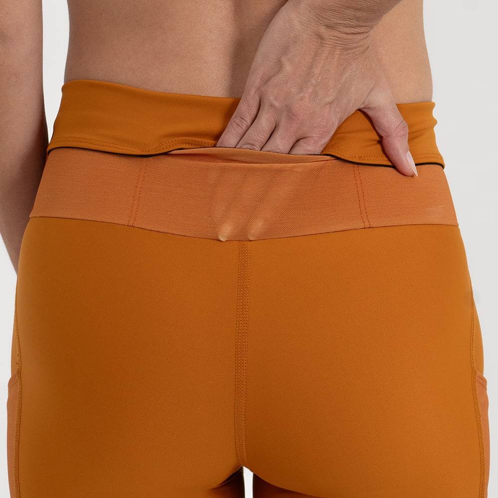 SHORT RUNNING TITÁN 2.0 CARROT PARA MUJER