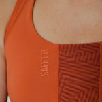 TOP RUNNING DUOMOTION CARROT PARA MUJER