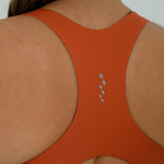 TOP RUNNING DUOMOTION CARROT PARA MUJER