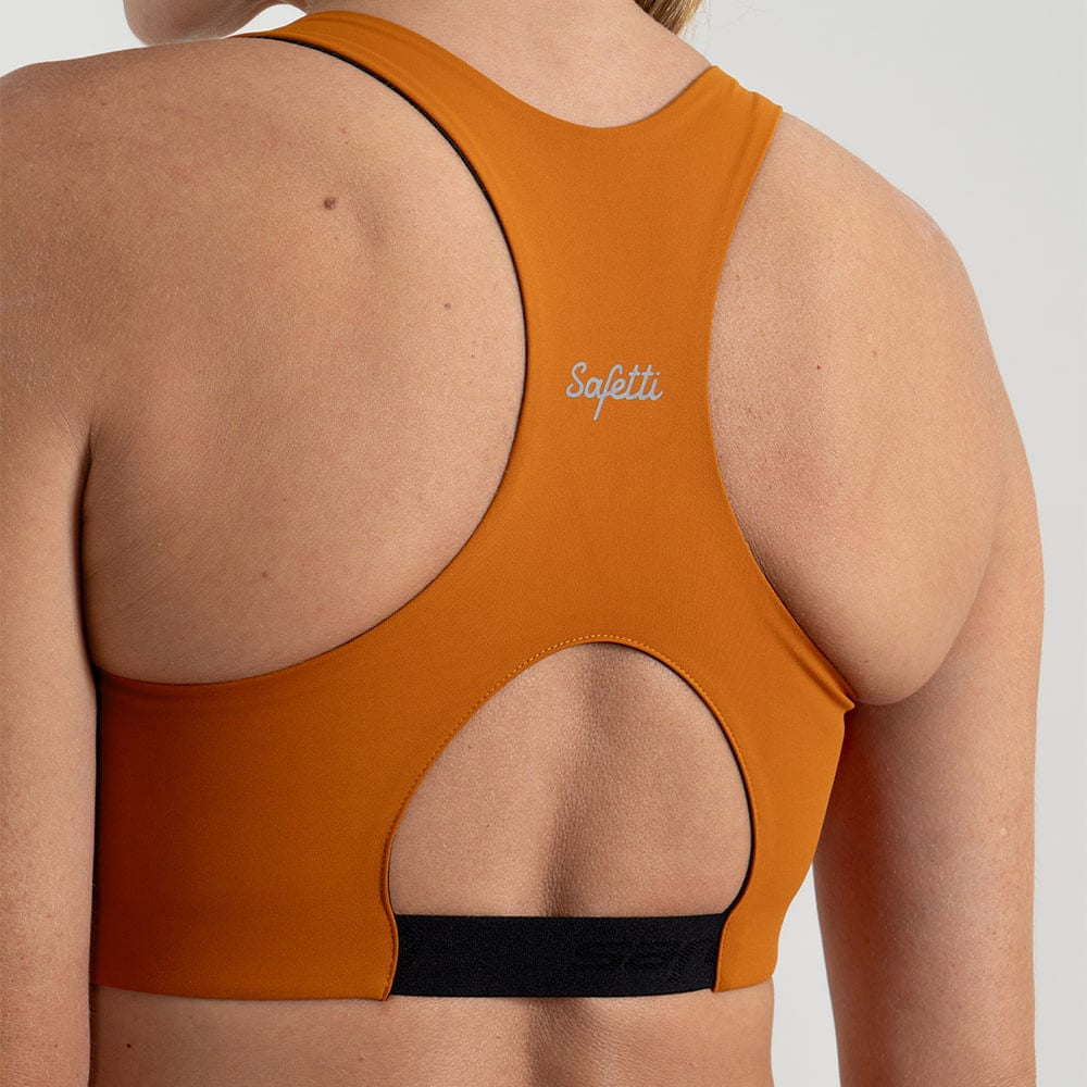 TOP RUNNING DEPORTIVO DUOMOTION NARANJA SOPORTE ALTO PARA MUJER